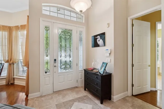 a view of a chairs and table in the patio