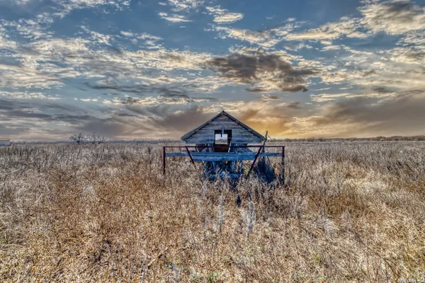 a sign board with parking space