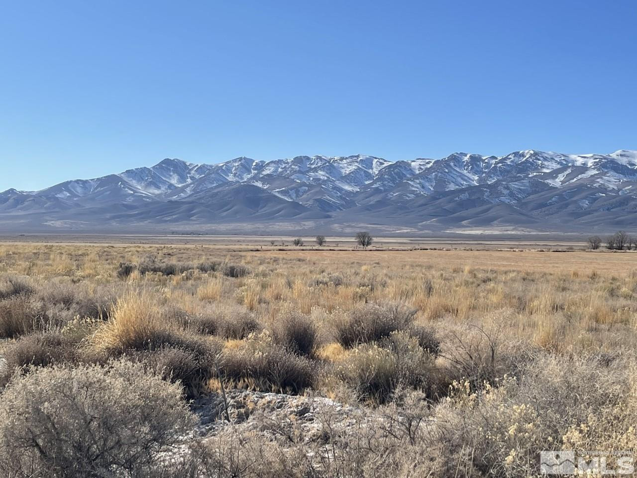 a view of an outdoor space and a mountain view