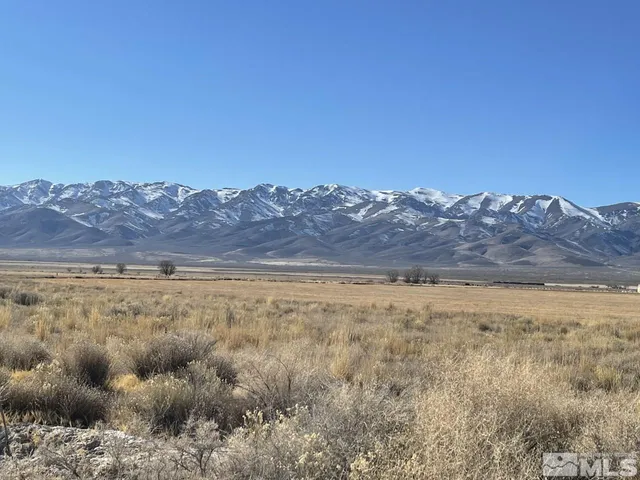 a view of an outdoor space with mountain view