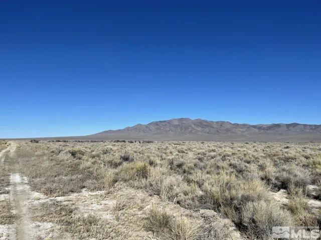 a view of mountain with lake view