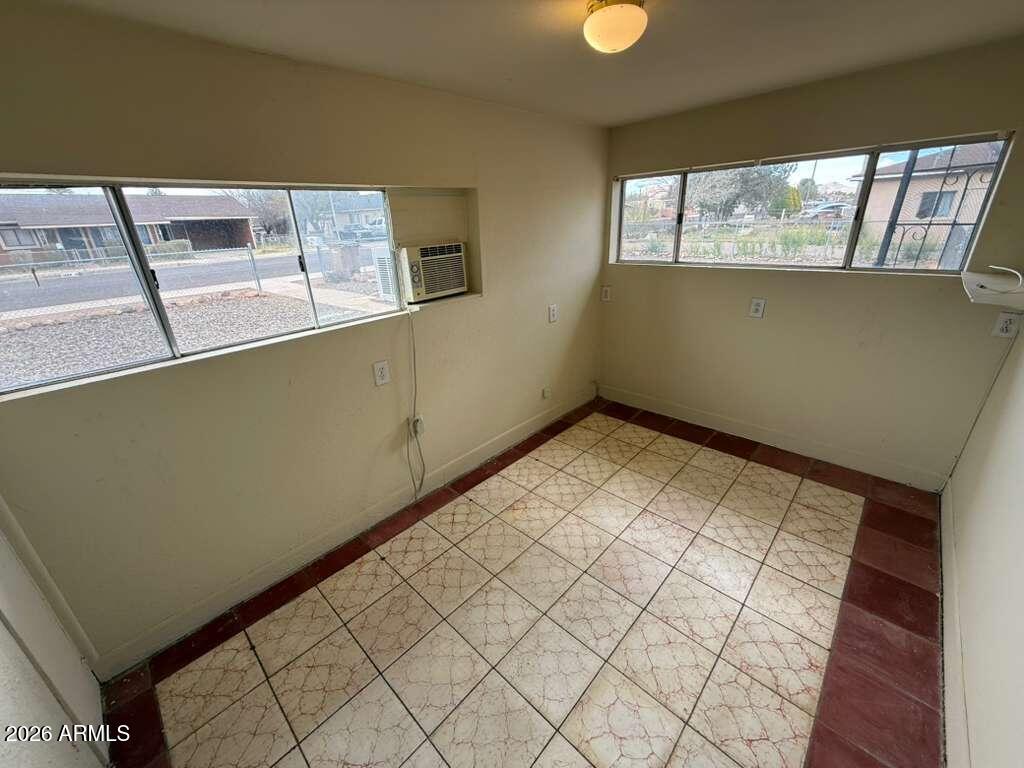 1365 East 20th Street Douglas, AZ 85607 - Photo 12 of 15 a view of an empty room with a window