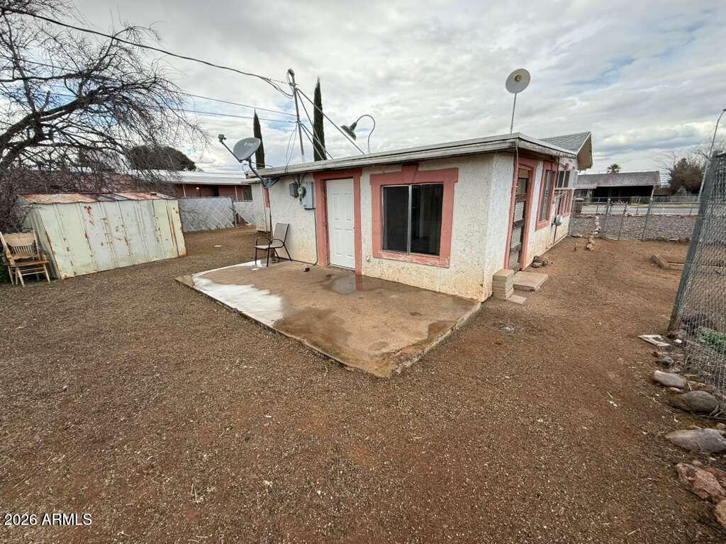 1365 East 20th Street Douglas, AZ 85607 - Photo 15 of 15 a front view of a house with garage