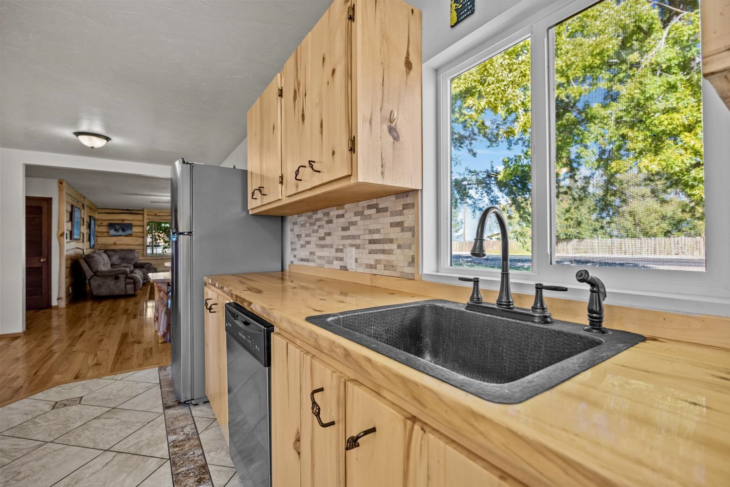 1903 J Road Fruita, CO 81521 - Photo 13 of 35 a kitchen that has a sink and a large window