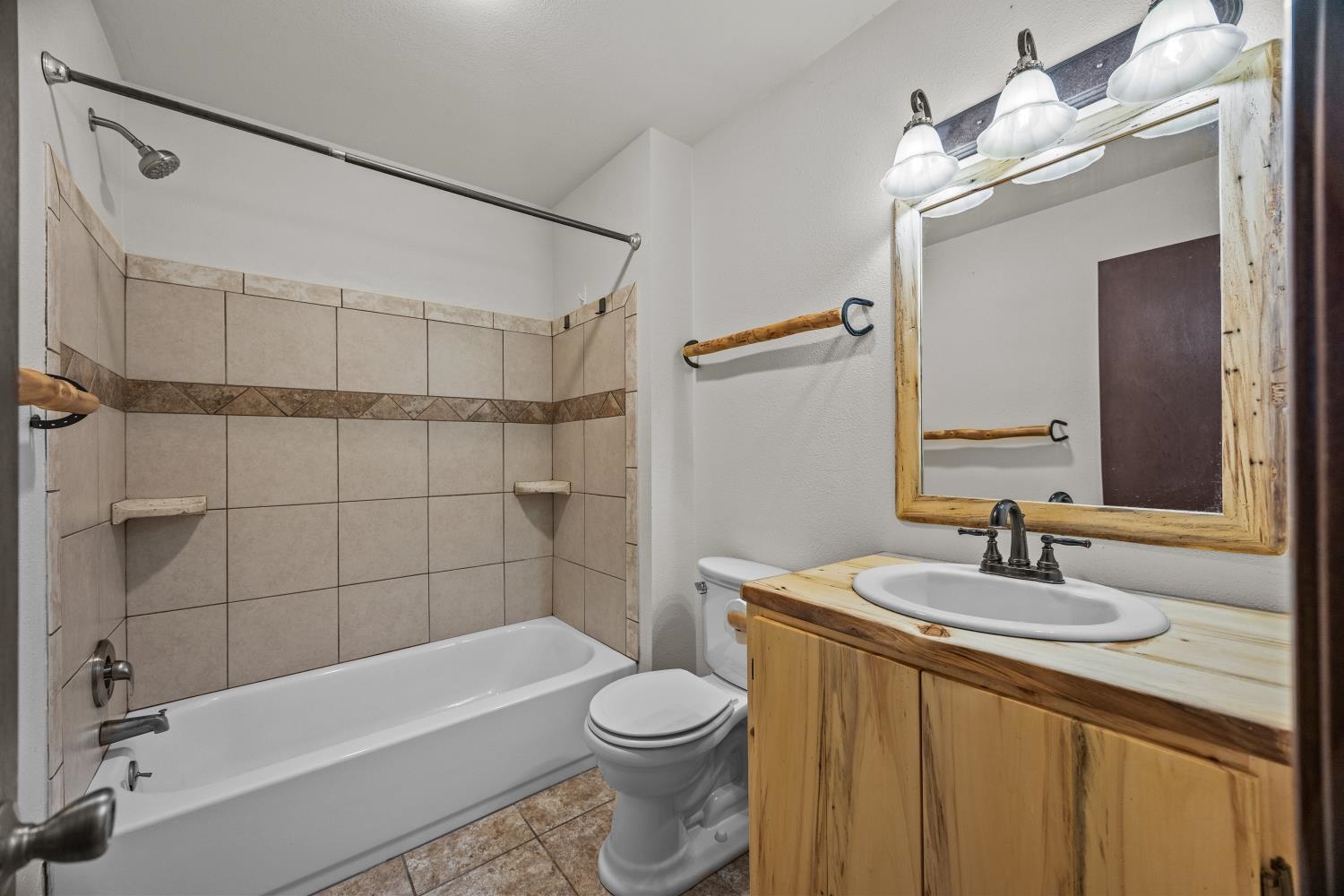 1903 J Road Fruita, CO 81521 - Photo 27 of 35 a bathroom with a sink a toilet and shower