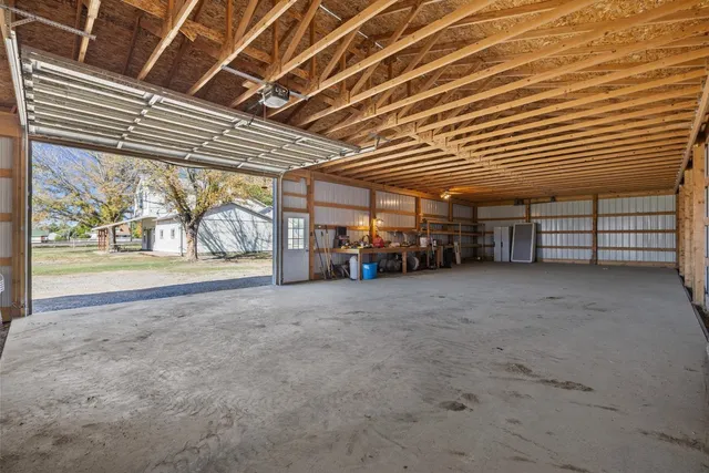 a view of a room with wooden walls
