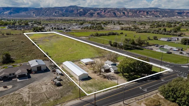 an aerial view of a swimming pool and outdoor space