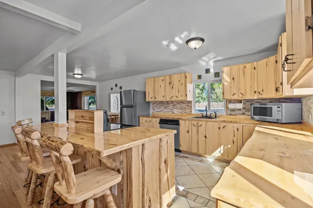 a large kitchen with cabinets