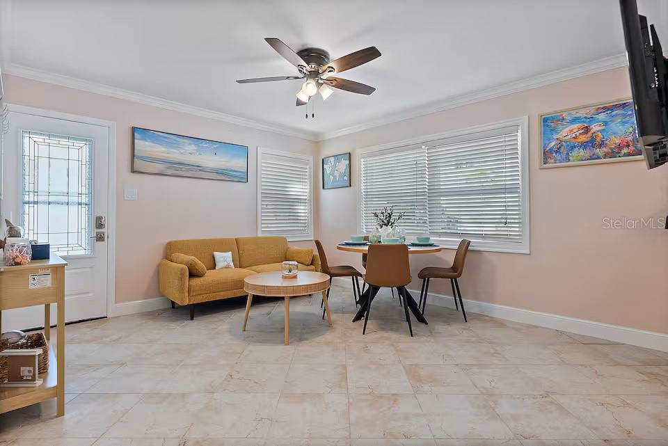 724 Gulf Boulevard Indian Rocks Beach, FL 33785 - Photo 14 of 55 a work room with furniture and windows