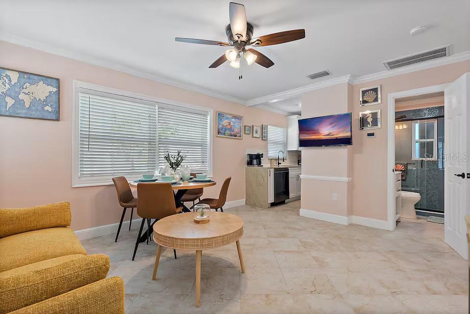724 Gulf Boulevard Indian Rocks Beach, FL 33785 - Photo 15 of 55 a living room with furniture and kitchen view