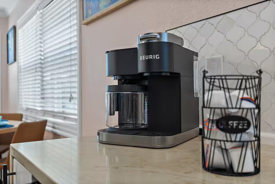 724 Gulf Boulevard Indian Rocks Beach, FL 33785 - Photo 18 of 55 a view of a living room and workspace