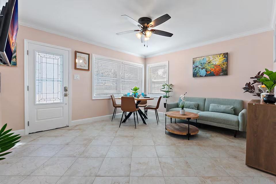 724 Gulf Boulevard Indian Rocks Beach, FL 33785 - Photo 26 of 55 a living room with furniture and windows