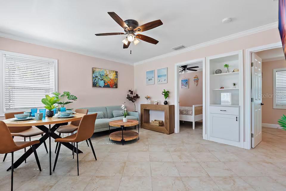 724 Gulf Boulevard Indian Rocks Beach, FL 33785 - Photo 27 of 55 a living room with furniture and a window