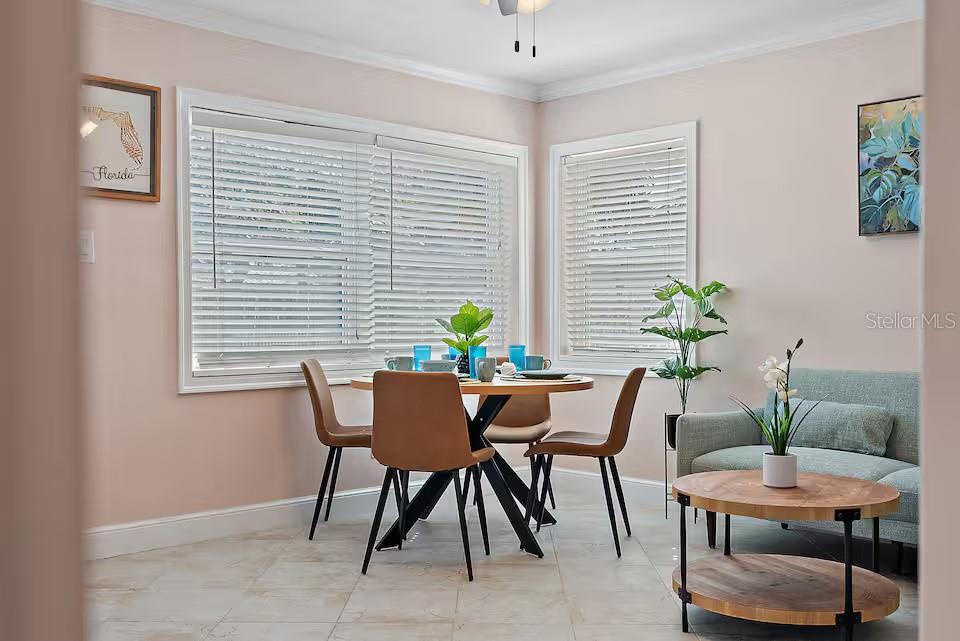 724 Gulf Boulevard Indian Rocks Beach, FL 33785 - Photo 30 of 55 a view of a dining room with furniture and window