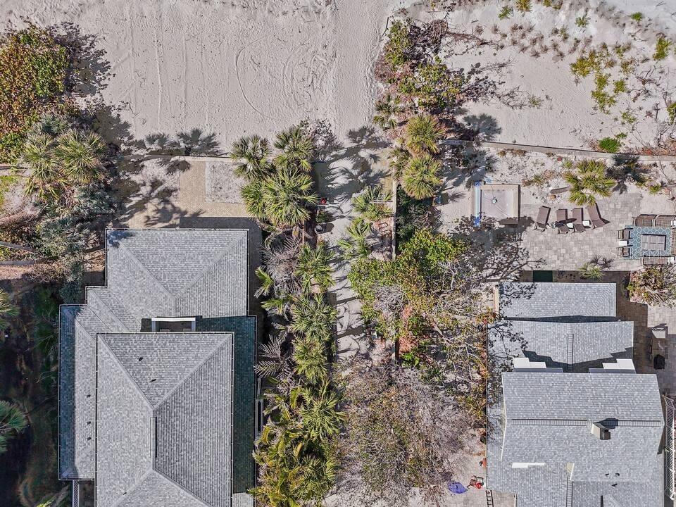 724 Gulf Boulevard Indian Rocks Beach, FL 33785 - Photo 55 of 55 an aerial view of residential houses with outdoor space
