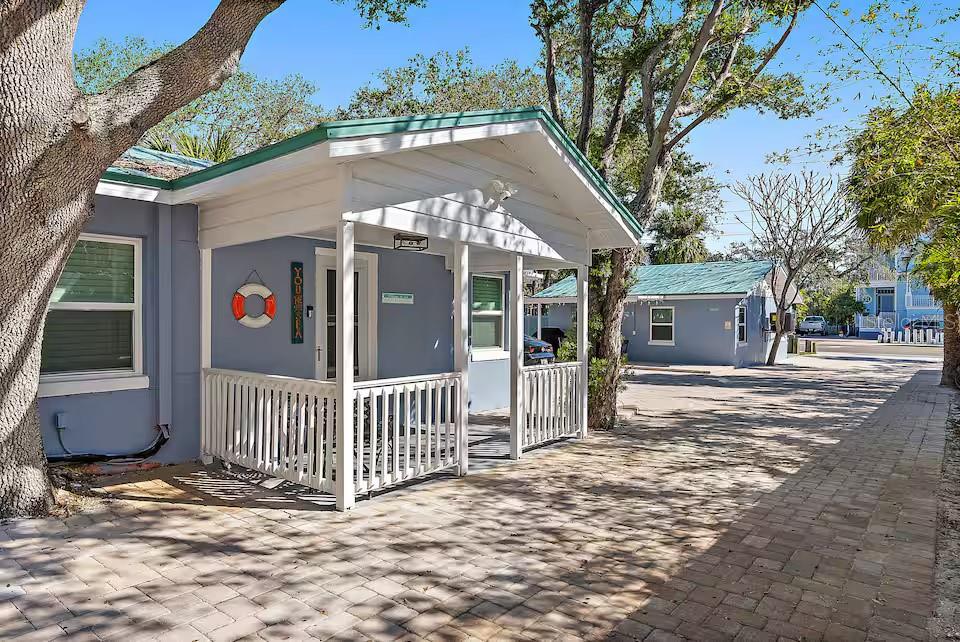 724 Gulf Boulevard Indian Rocks Beach, FL 33785 - Photo 8 of 55 a view of a entrance gate of a house