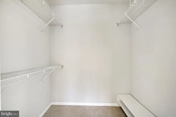 a view of small space with racks on the wall