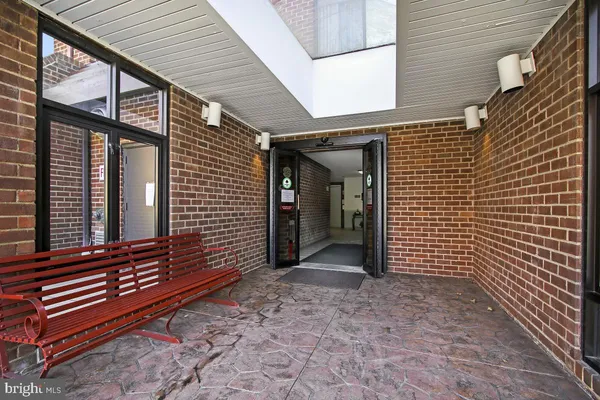 a view of a porch with wooden stairs