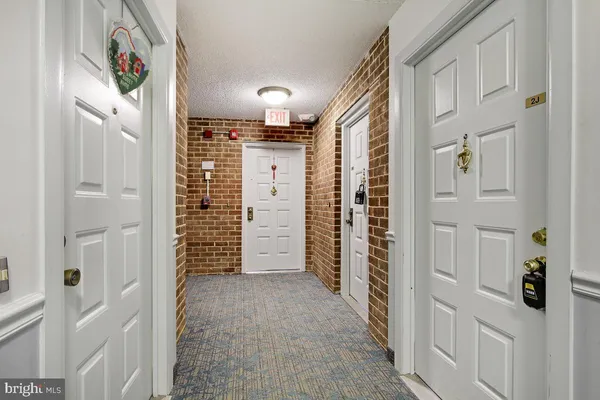 a view of entryway with stairs and furniture
