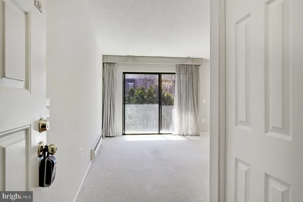 a view of empty room with front door