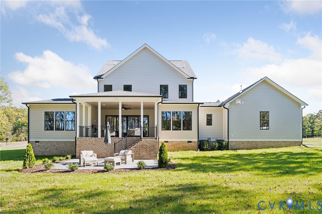 4976 Gooden Trail Quinton, VA 23141 - Photo 44 of 49 a front view of house with yard and green space