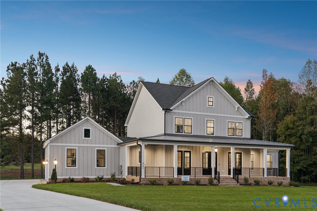 4976 Gooden Trail Quinton, VA 23141 - Photo 5 of 49 a front view of a house with a garden
