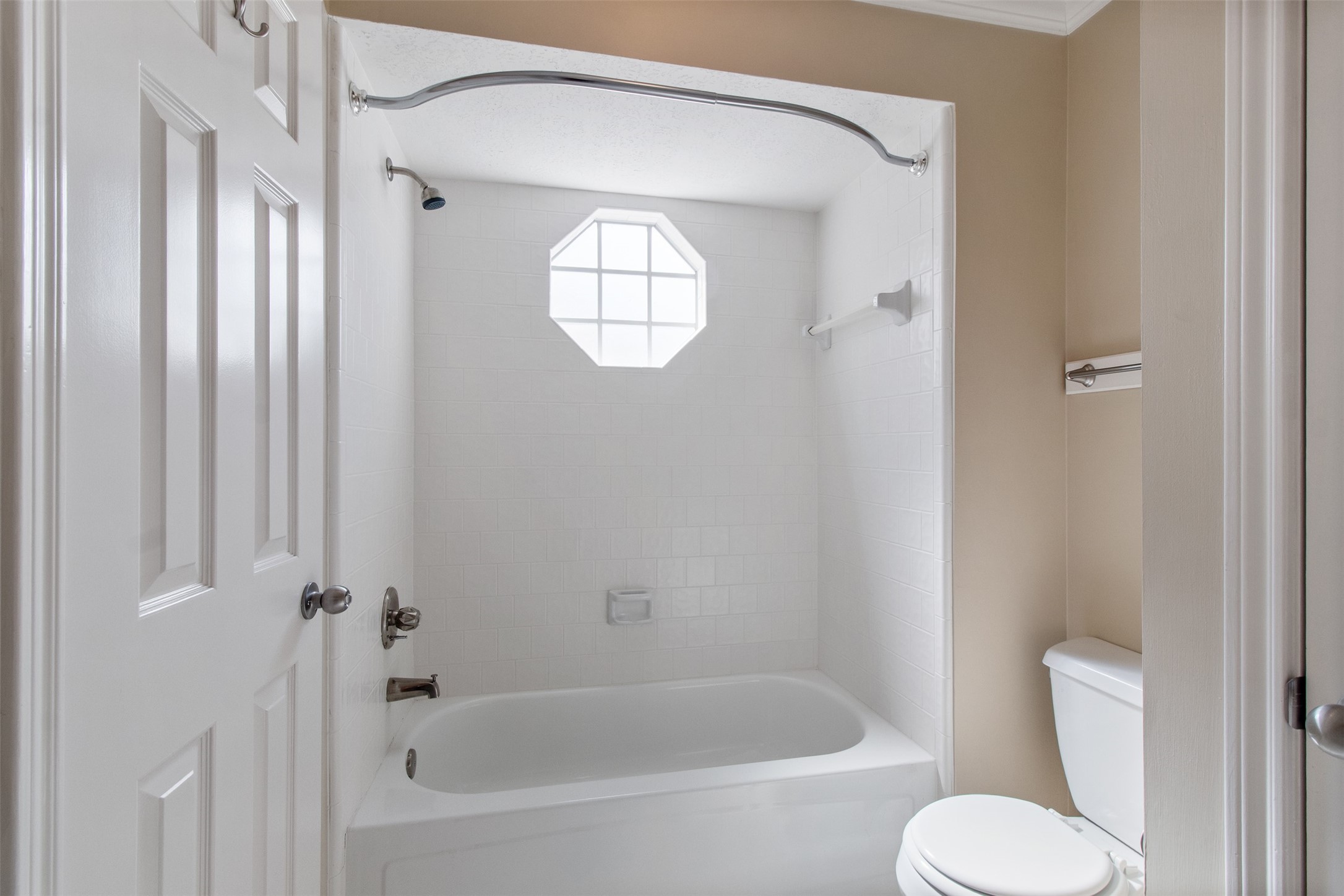 5127 Heathfield Court Houston, TX 77084 - Photo 22 of 37 Who doesn't love a cute window in the bathroom.