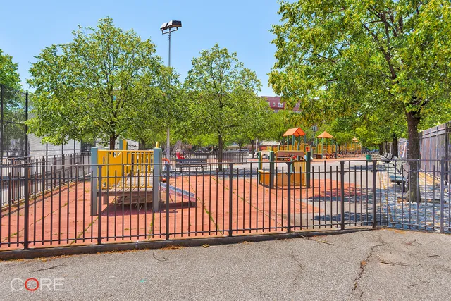 a view of a gate and fence