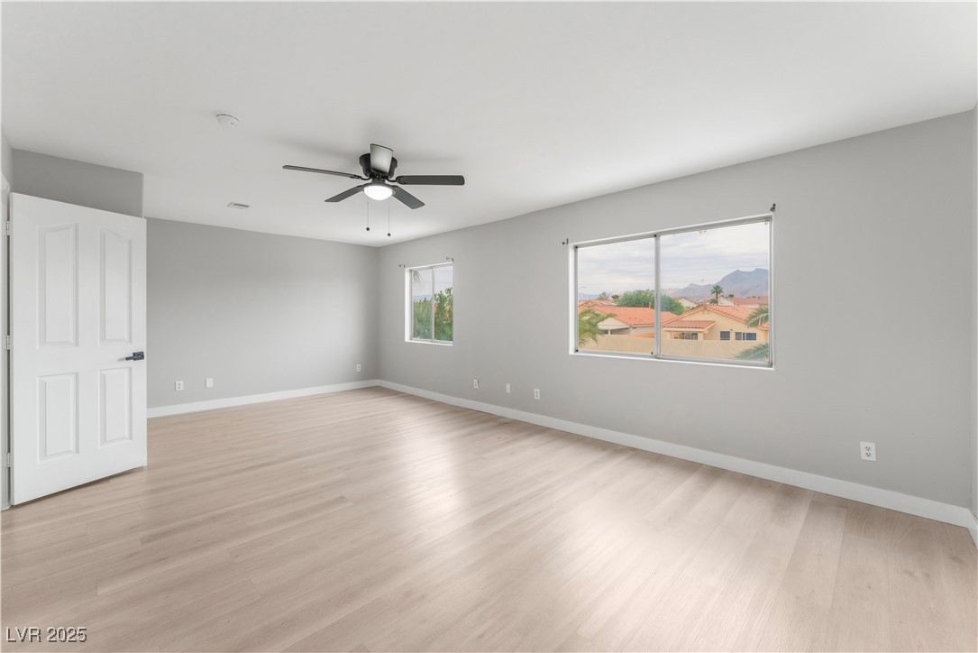 3695 Funston Way Las Vegas, NV 89129 - Photo 30 of 43 Spare room with light wood-style flooring and ceiling fan