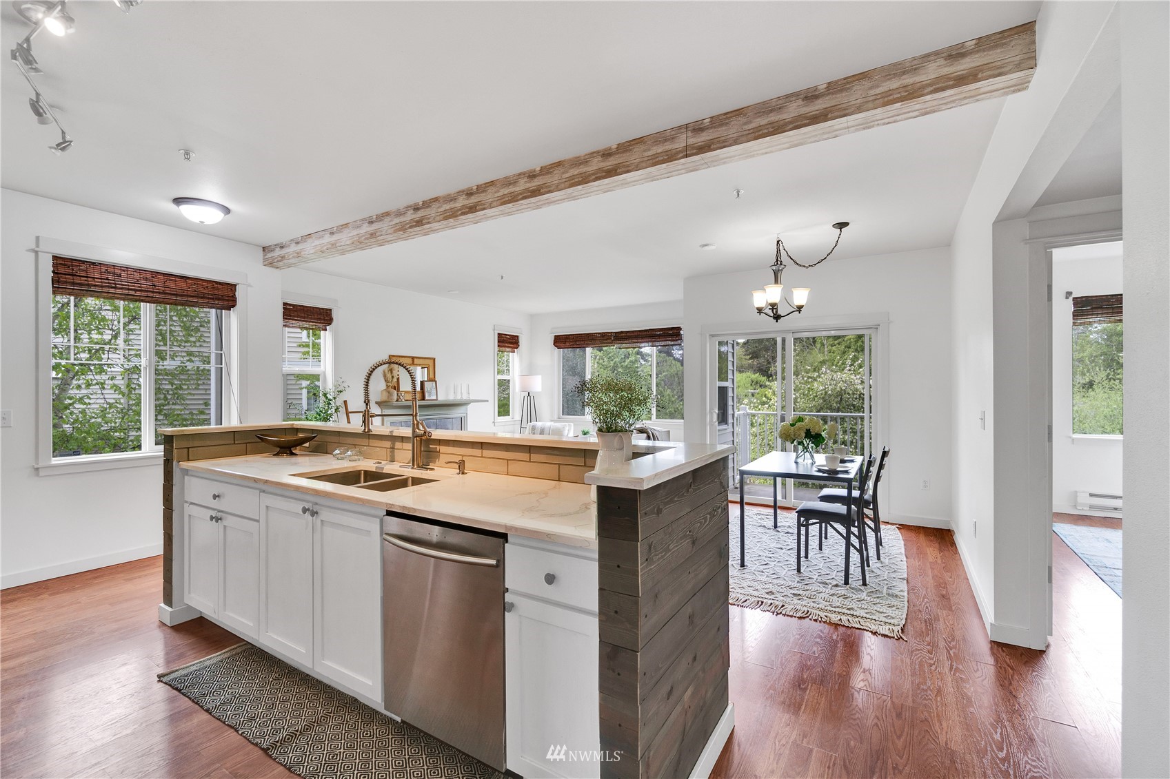 2009 196th Street Southeast, Unit C201 Bothell, WA 98012 - Photo 12 of 36 a view of a kitchen from a dining room