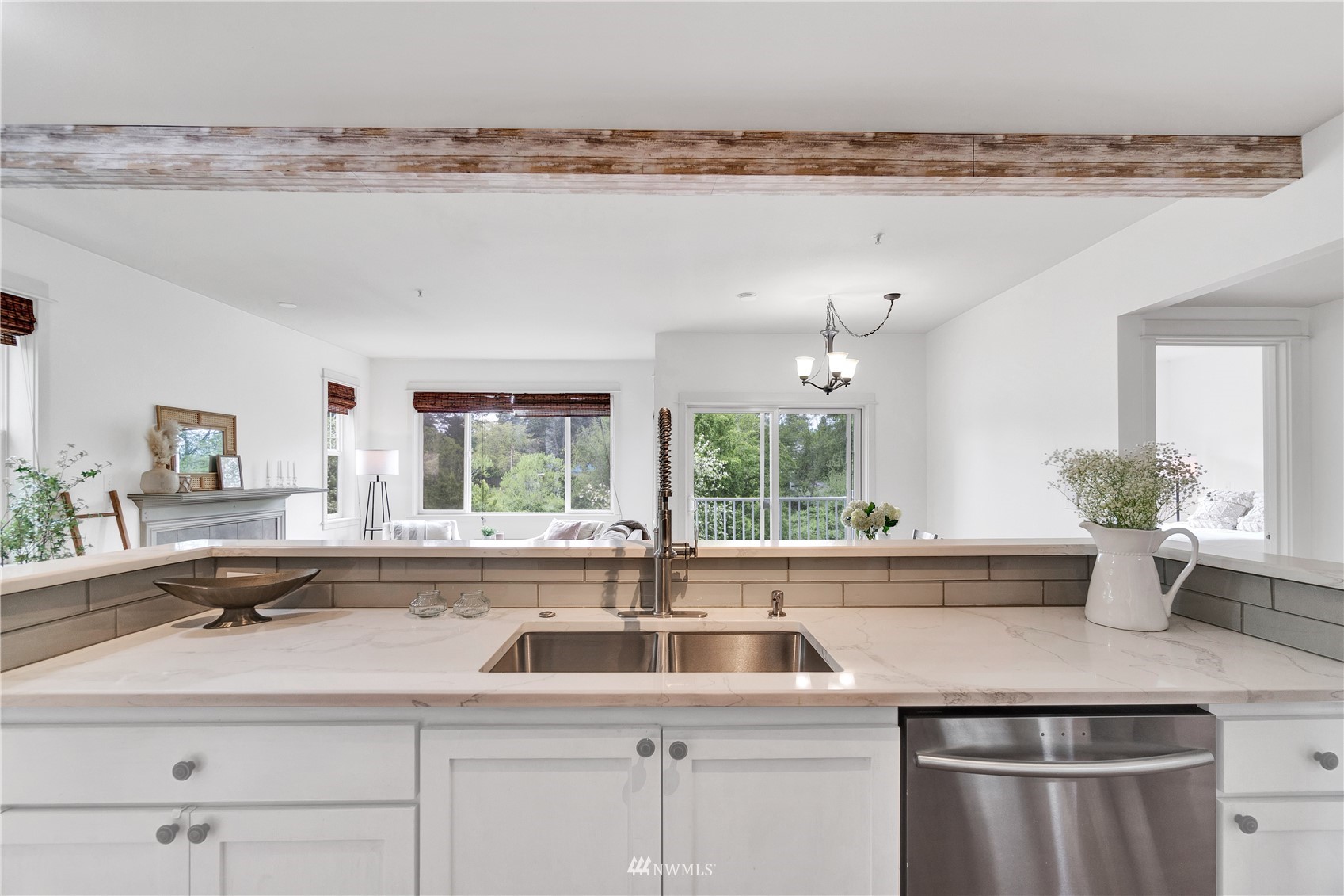 2009 196th Street Southeast, Unit C201 Bothell, WA 98012 - Photo 13 of 36 a kitchen with a sink and a large window