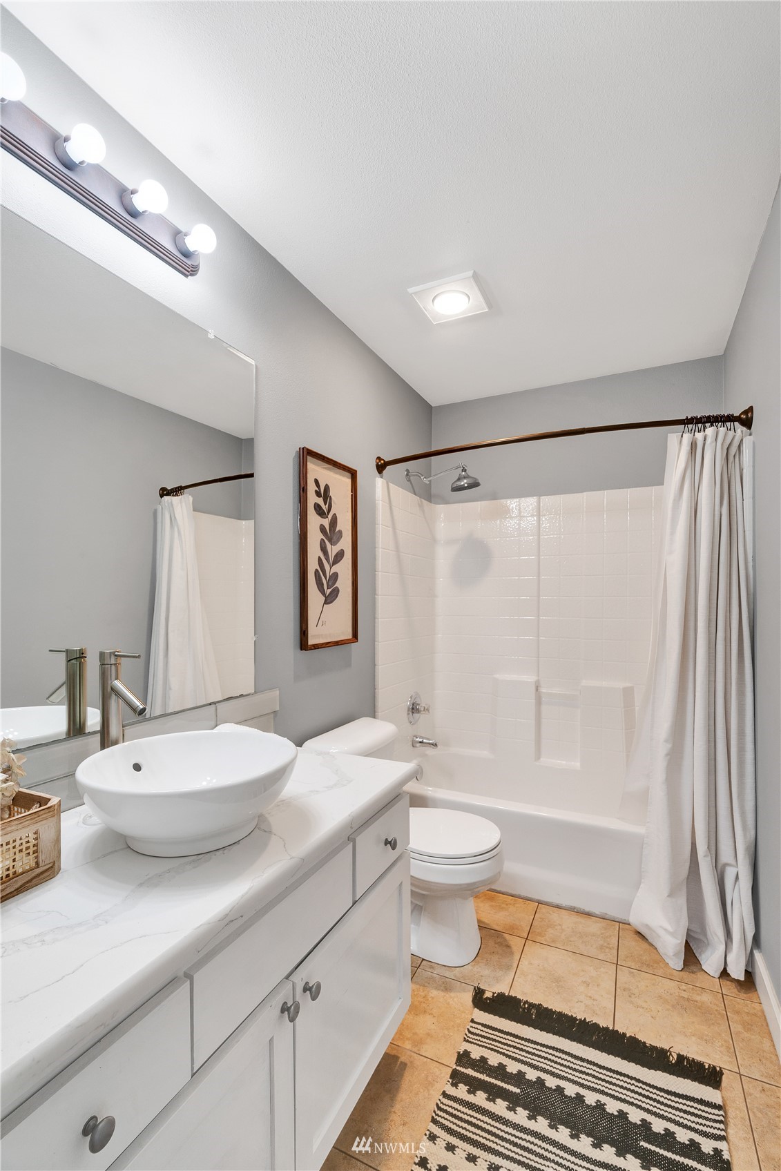2009 196th Street Southeast, Unit C201 Bothell, WA 98012 - Photo 9 of 36 a bathroom with a double vanity sink toilet mirror and shower