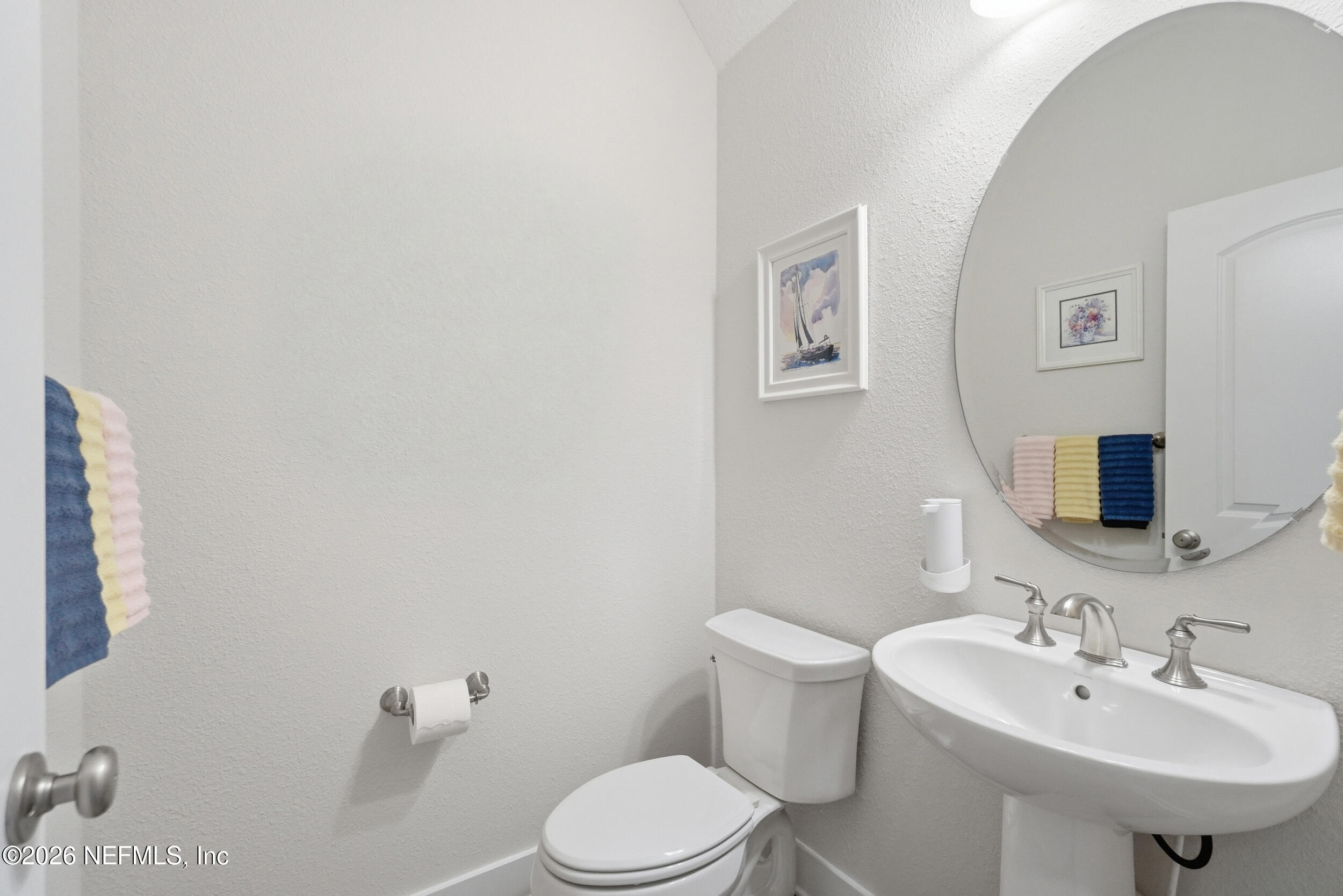 34 Red Rock Lane St. Johns, FL 32259 - Photo 29 of 71 a bathroom with a sink toilet and mirror