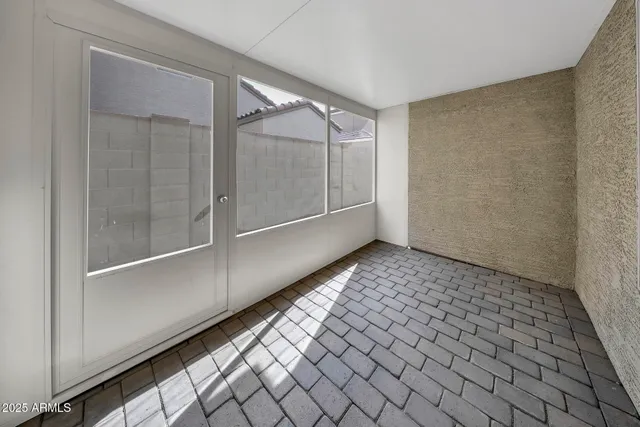 a view of a room with windows