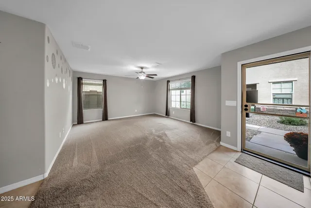 a view of livingroom with hardwood floor and hallway