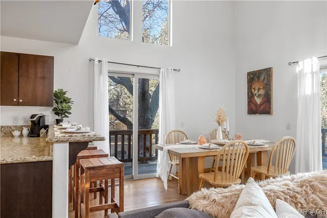 a view of a livingroom with furniture and window