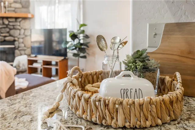 a view of a bedroom with a bed and a couch
