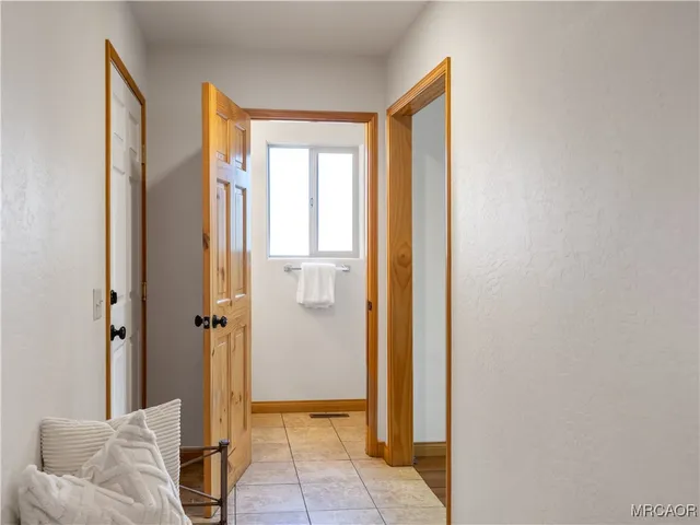 a bathroom with a tub and shower