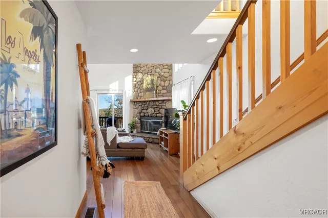 a view of living room with furniture and stairs