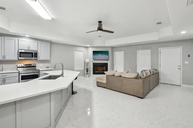 a view of an entryway with wooden floor