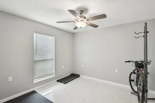 a bathroom with a toilet a sink and a mirror