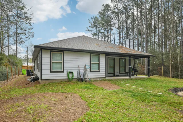 a backyard of a house with lots of green space