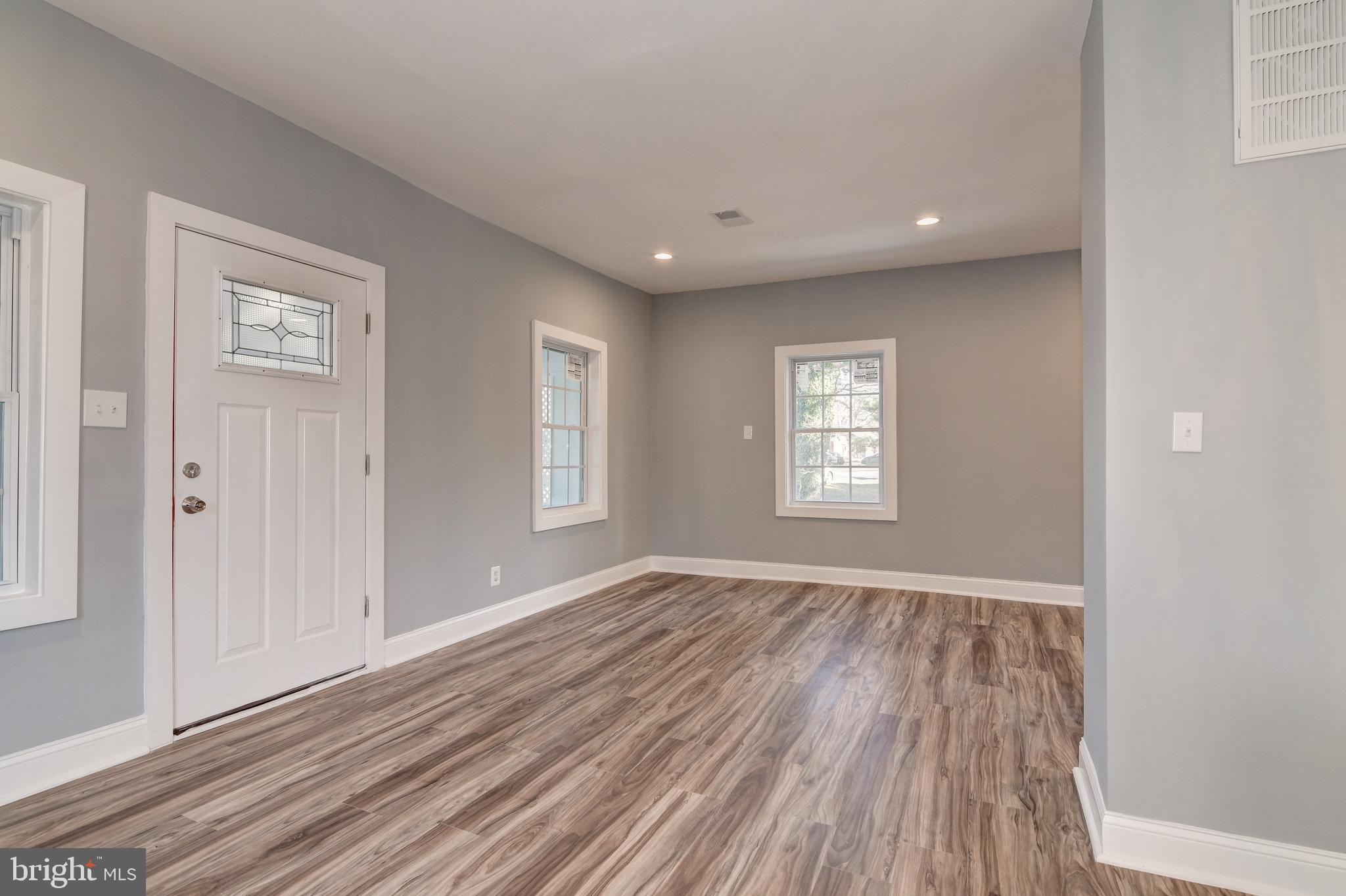 9007 Ardmore Road Springdale, MD 20706 - Photo 12 of 56 A lot of natural light through brand new windows