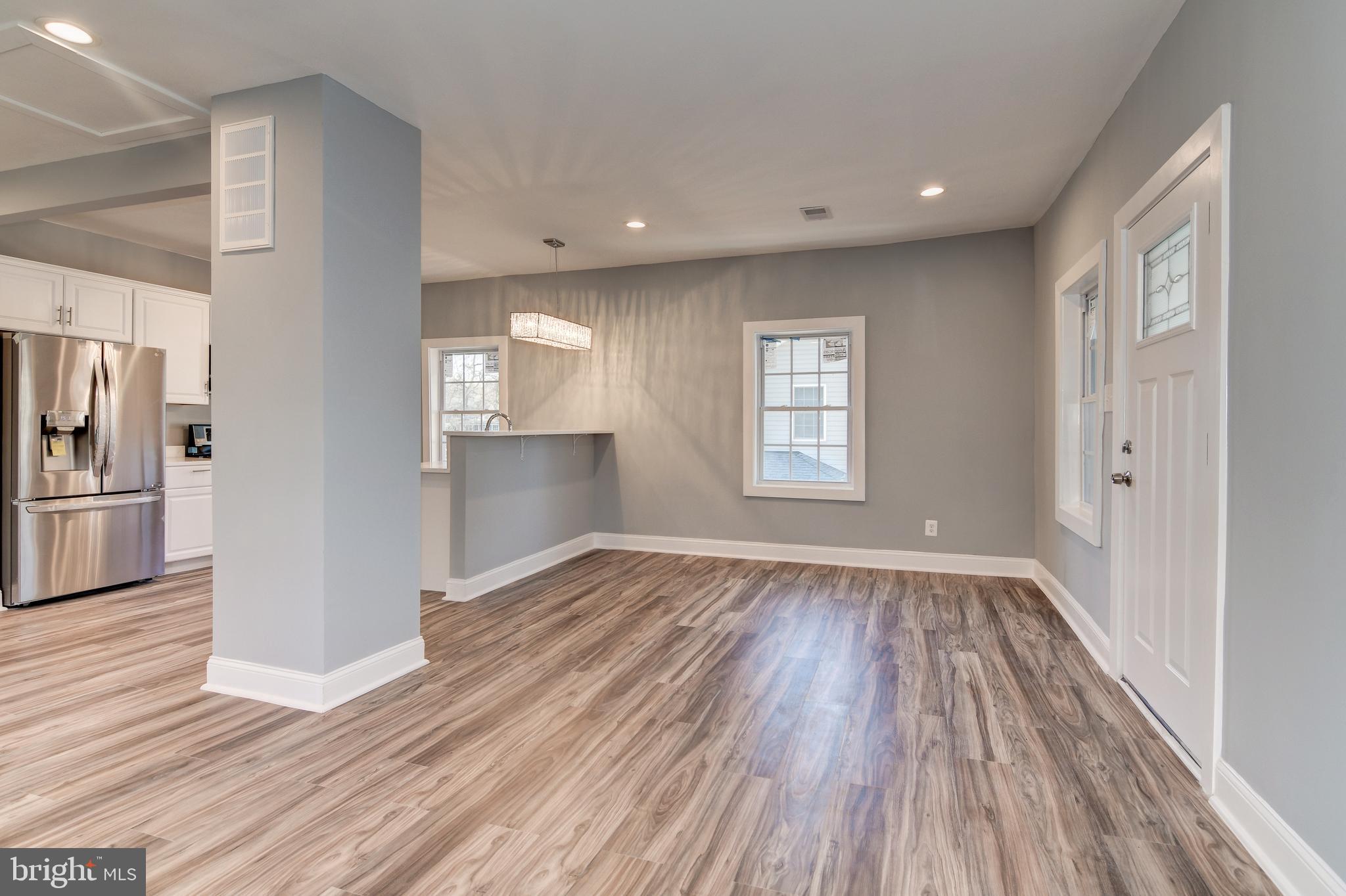 9007 Ardmore Road Springdale, MD 20706 - Photo 13 of 56 Nice brand new hardwood floors