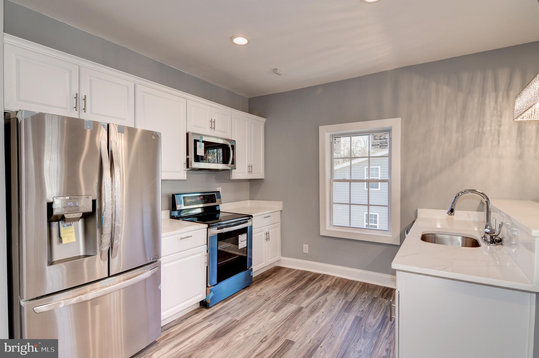 9007 Ardmore Road Springdale, MD 20706 - Photo 18 of 56 brand new stainless steel appliances