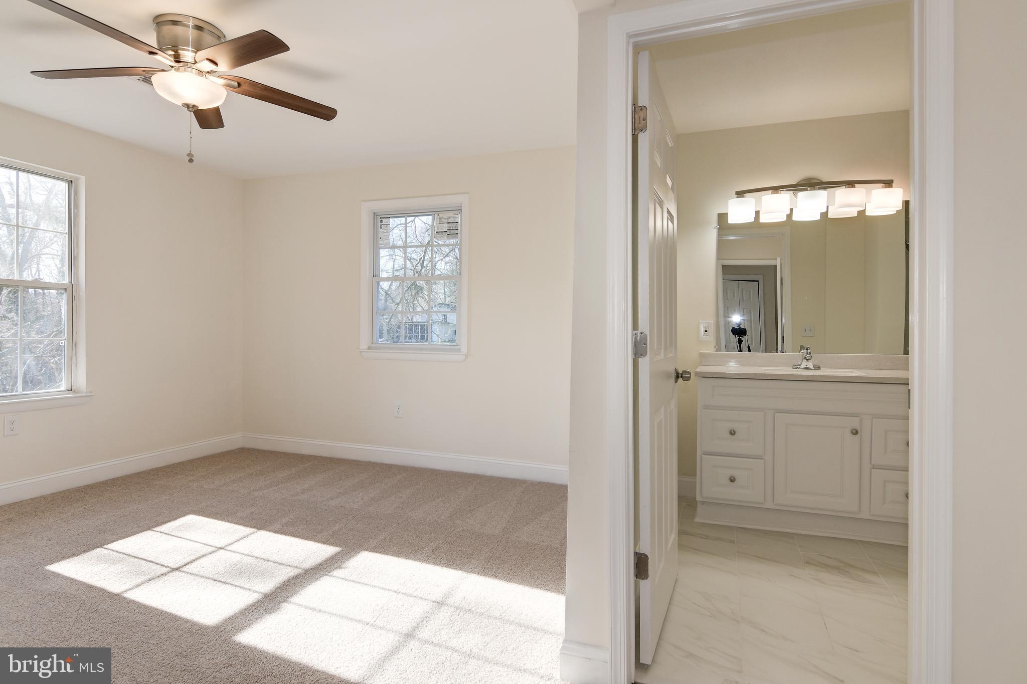 9007 Ardmore Road Springdale, MD 20706 - Photo 24 of 56 Master bedroom with its own private bathroom