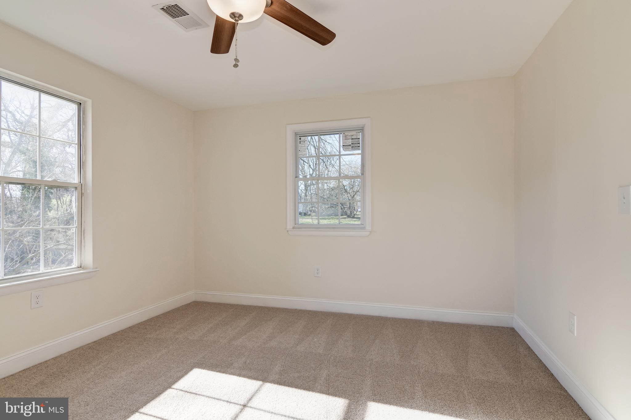 9007 Ardmore Road Springdale, MD 20706 - Photo 27 of 56 Lots of natural light in master bedroom