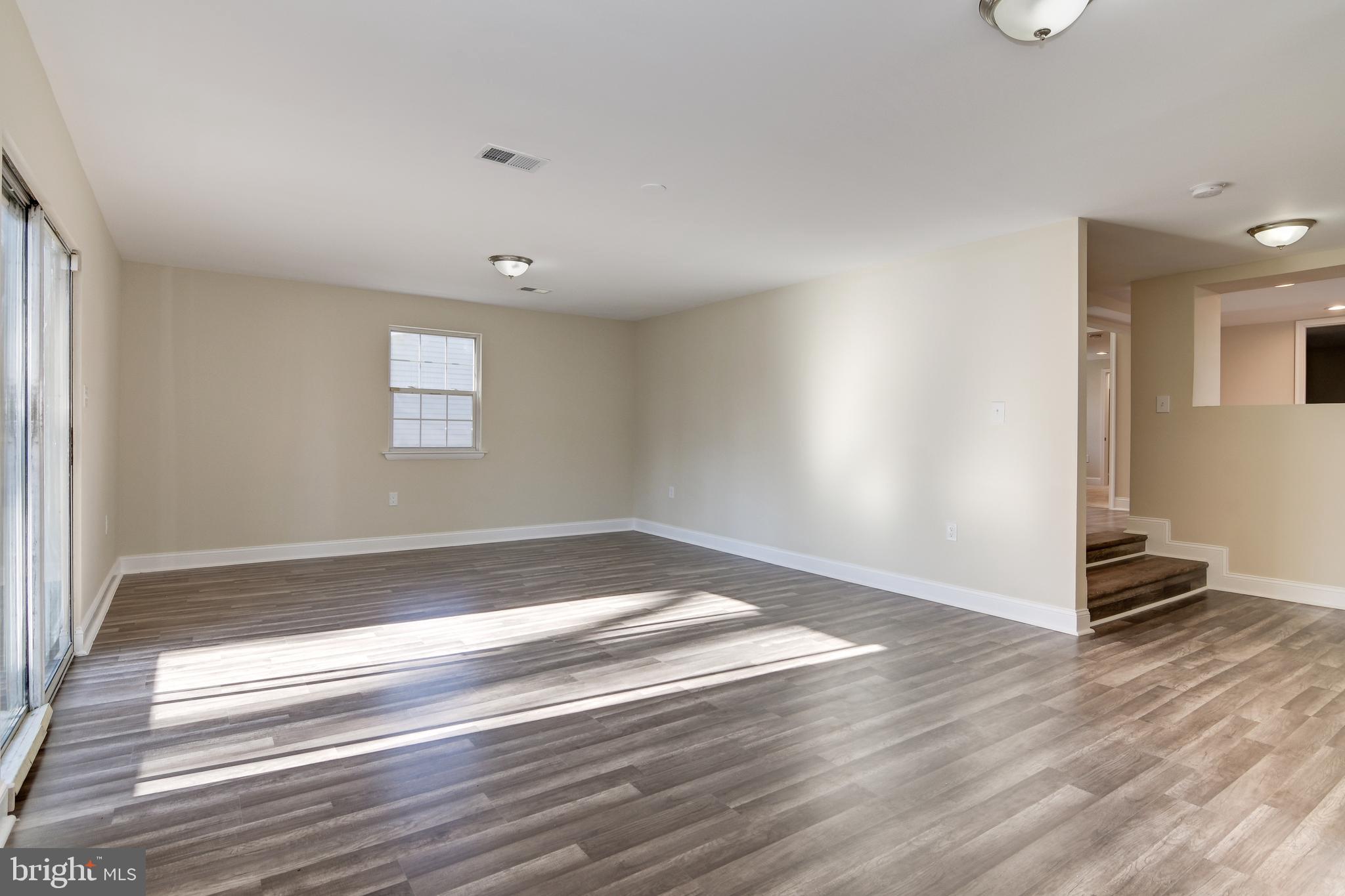9007 Ardmore Road Springdale, MD 20706 - Photo 37 of 56 Brand new flooring
