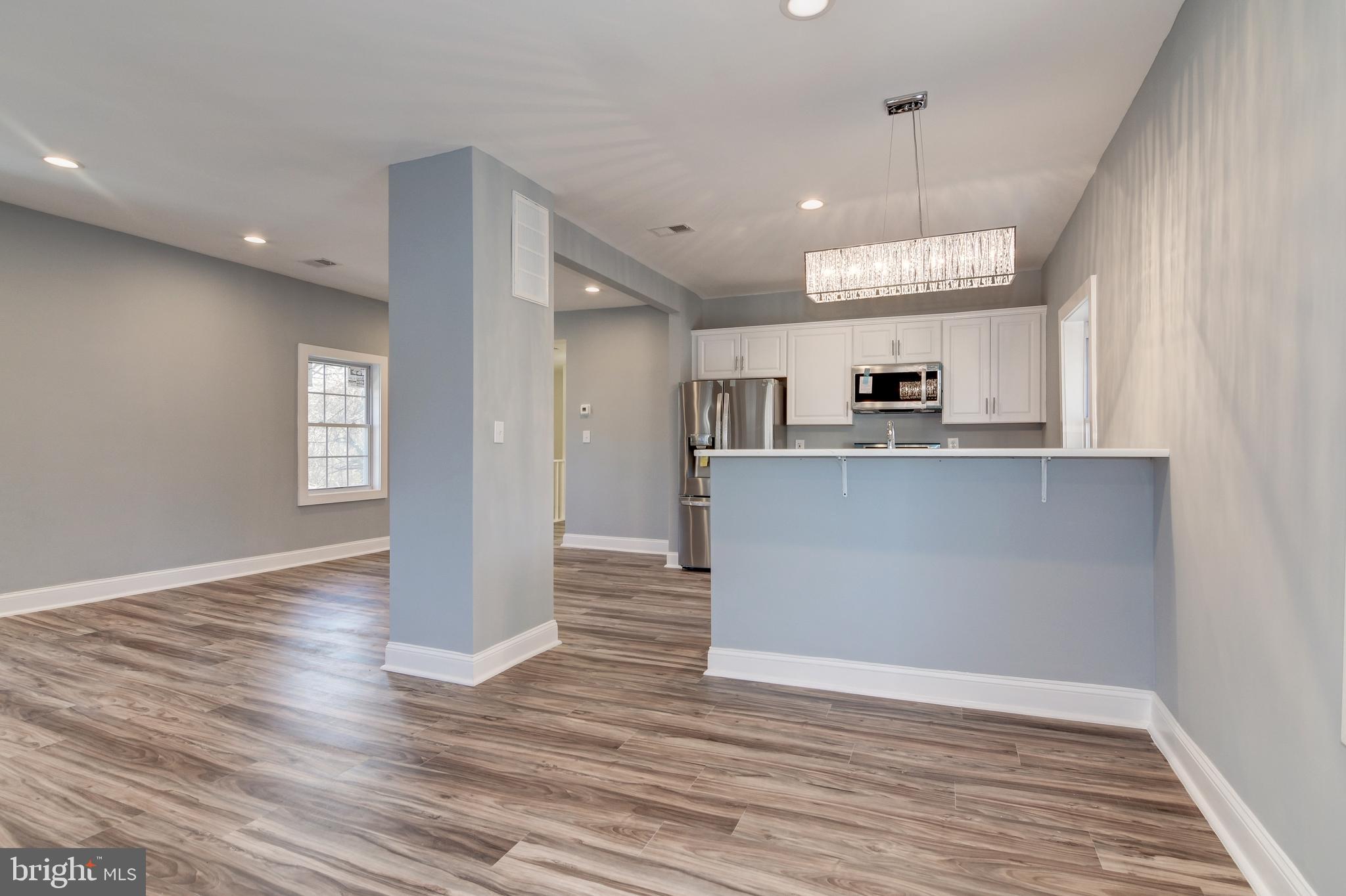 9007 Ardmore Road Springdale, MD 20706 - Photo 10 of 56 open concept living and kitchen