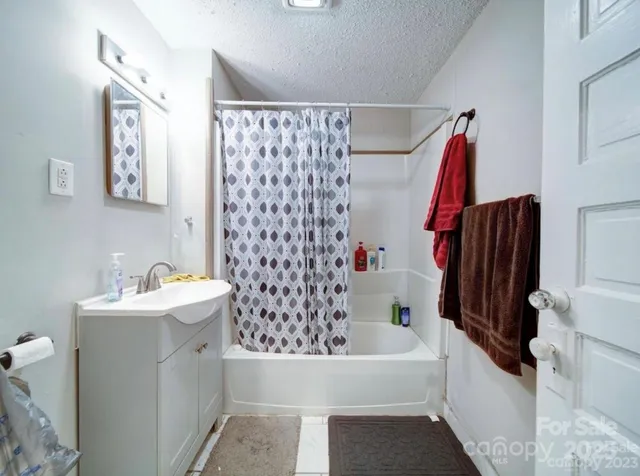 a bathroom with a sink and a bathtub